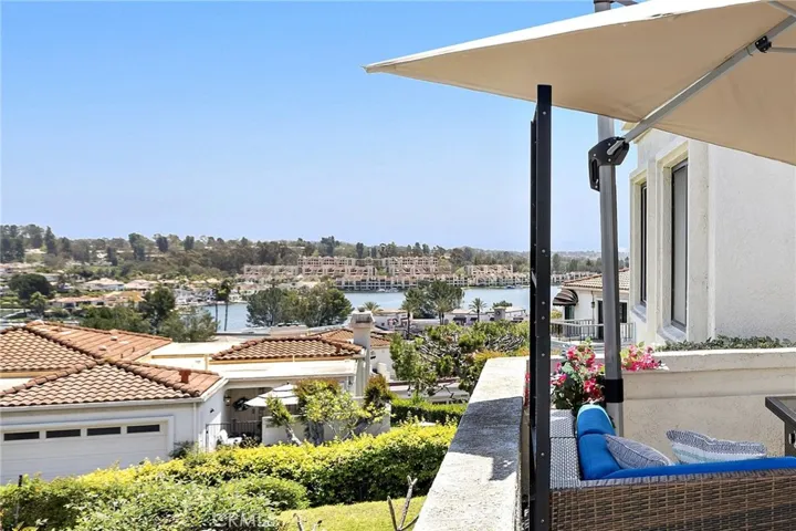 One of the very very few homes with a lake view from the FRONT patio as well as the back patio!