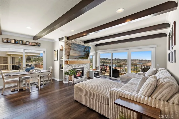 Gorgeous stone fireplace - and its bright and beautiful and perfectly updated!  Did you notice the view?  Com see it in person!  Its beautiful!