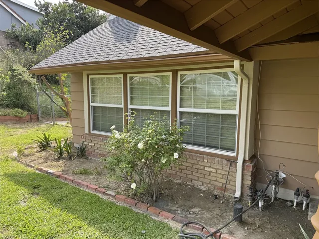 LEFT OF FRONT DOOR