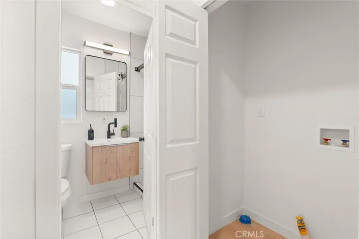 Laundry area adjacent to kitchen