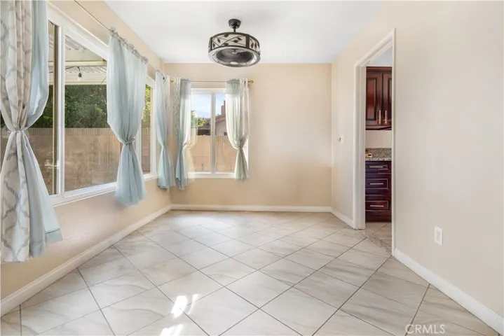 sunroom off the kitchen- digitally emptied