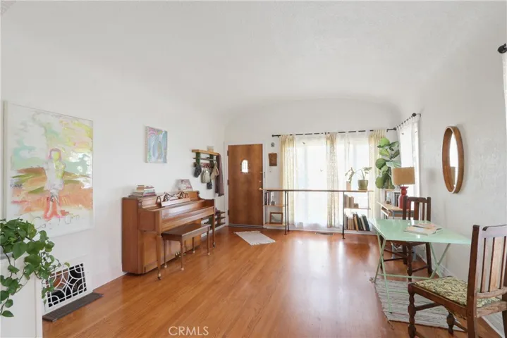 Hardwood oak flooring in living room, dining room, hall and both bedrooms.