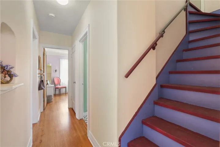 Stairs in wall way up to attic!