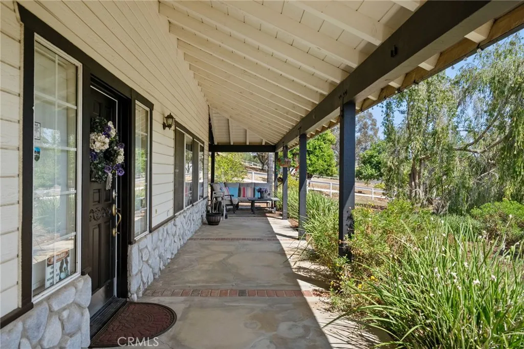 Large Covered wrap around Porch & Patio