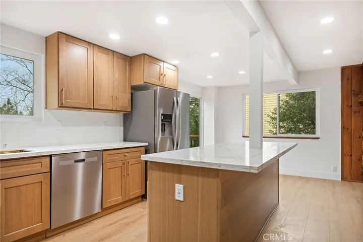 Quartz counters, wood cabinets
