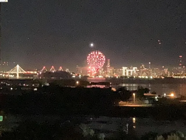 Twilight view of city with fireworks sellers photo