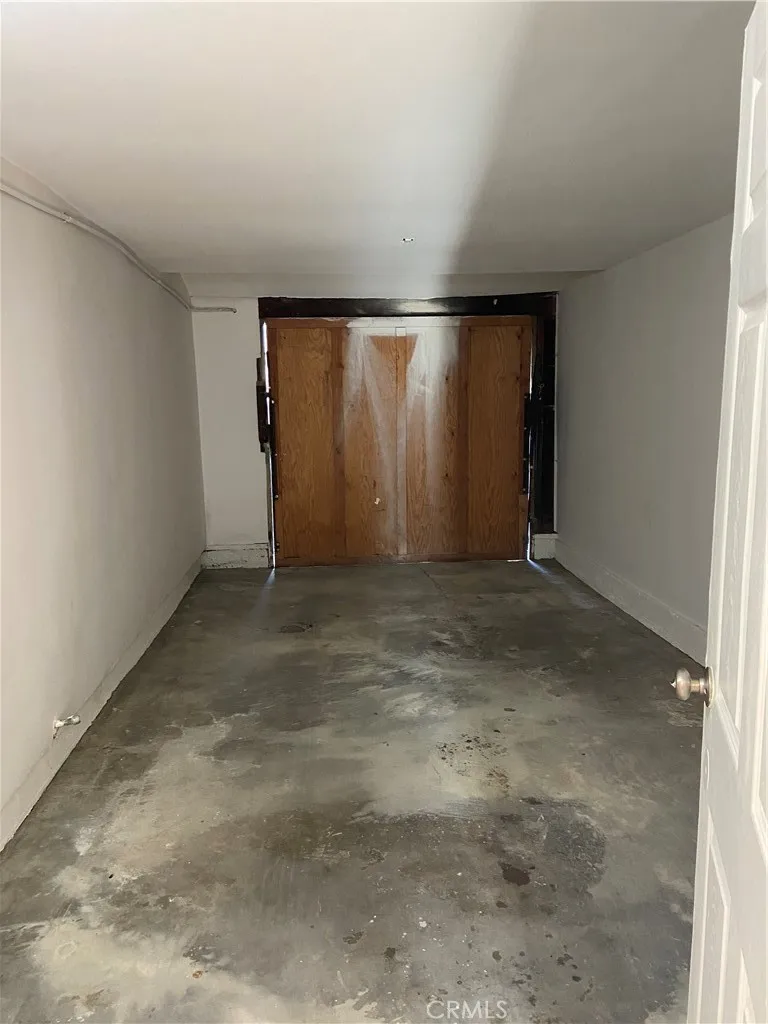 Drywalled garage ideal for use as an exercise room