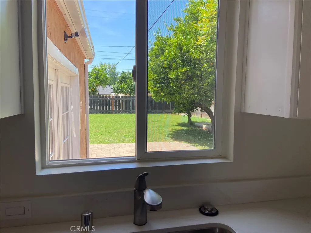 View of back yard from kitchen sink
