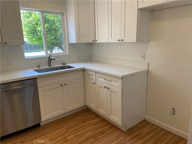 New kitchen cabinetry with quartz countertops