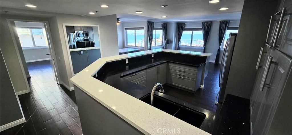 The moment you enter, the home unfolds with stunning ocean views and a warm, open layout that invites you to relax and enjoy every inch of the space.