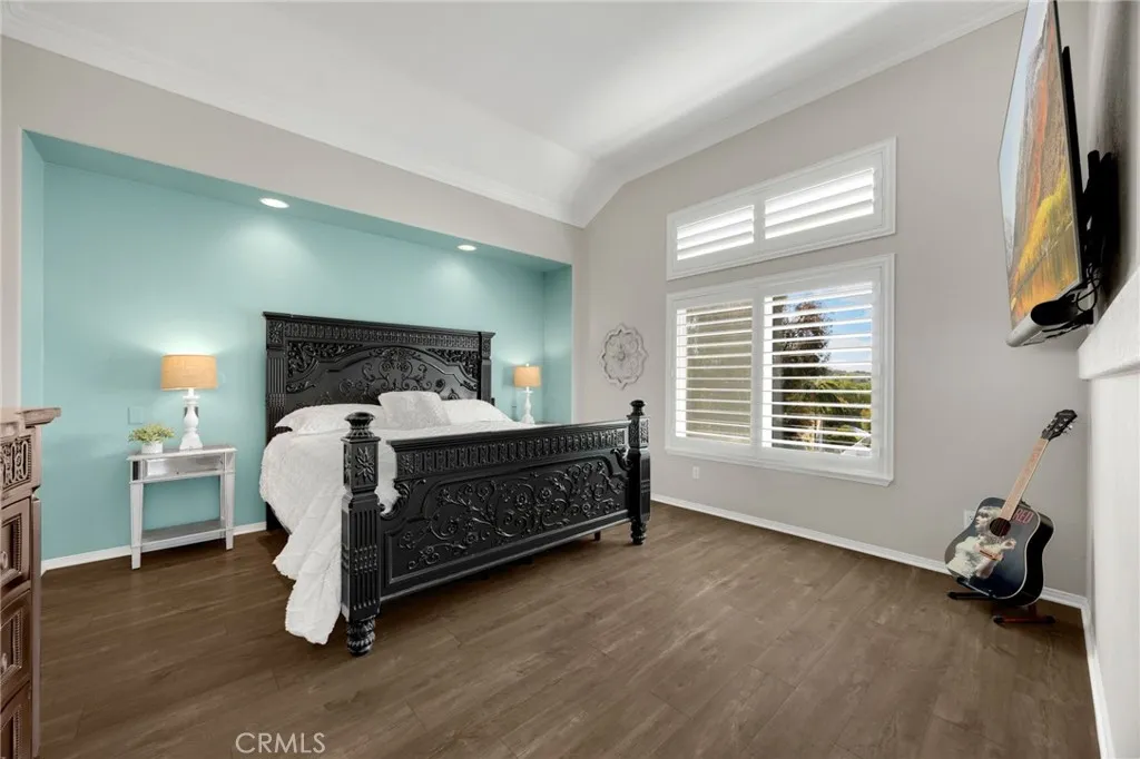 Relax in the serene primary suite