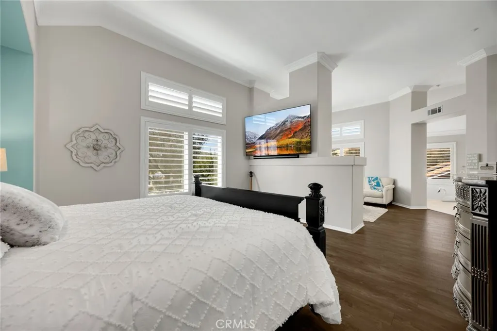 Spacious primary suite featuring a dual-sided fireplace, retreat area, and warm natural light-your own private coastal sanctuary 

Spacious primary suite featuring a dual-sided fireplace, retreat area, and warm natural light -your own private coastal sanctuary