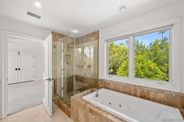 Detacehd guest home primary bedroom suite bath.