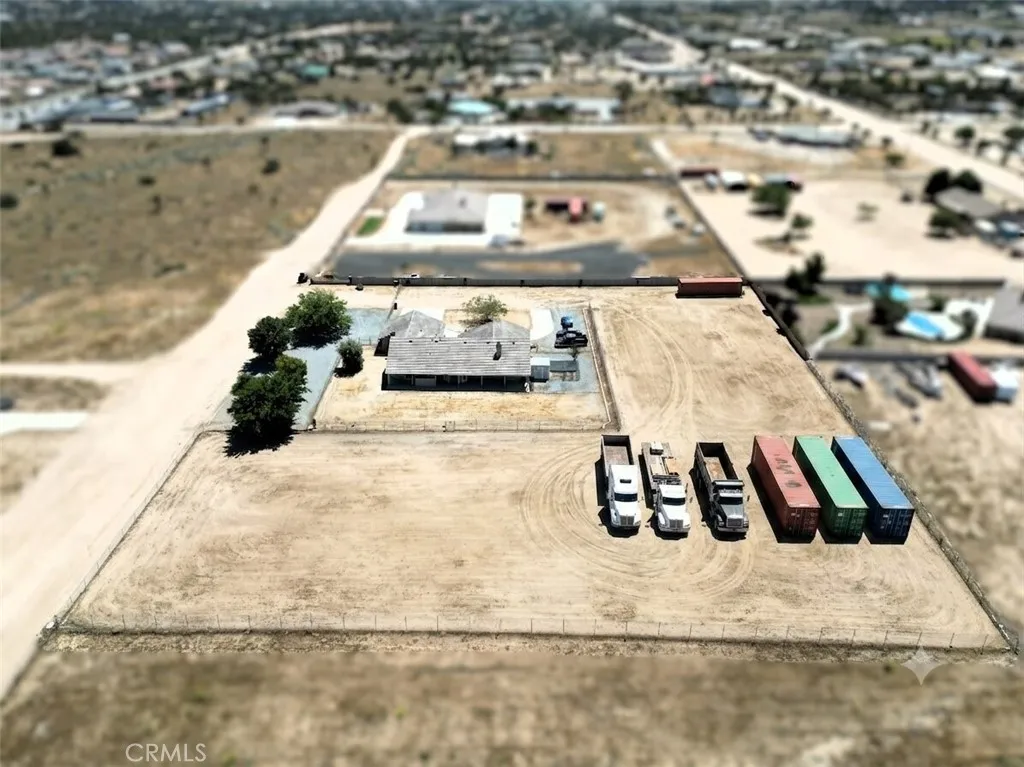 Photo is digitally altered to show lot potential.