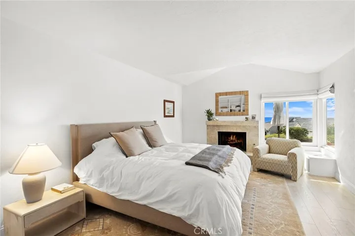 Primary bedroom Suite w/ fireplace and views