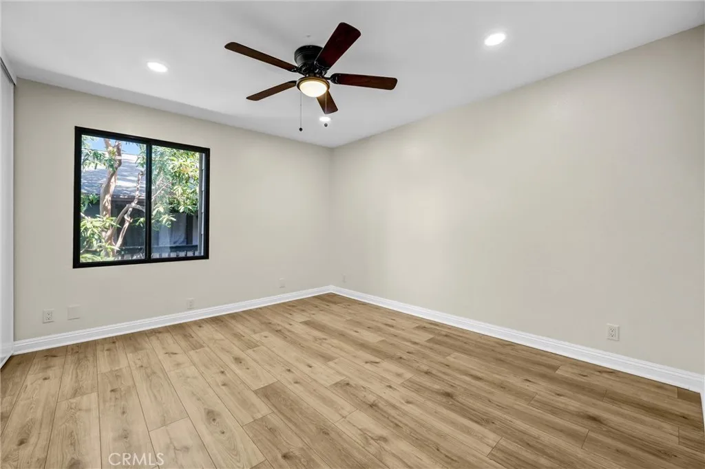 Second view of the primary bedroom.