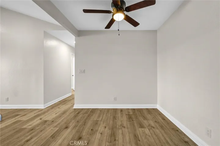 The view from the kitchen into the dining room.