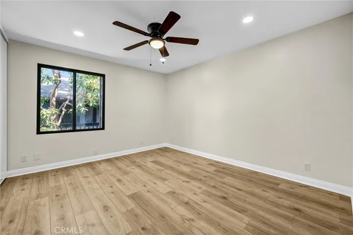 Second view of the primary bedroom.