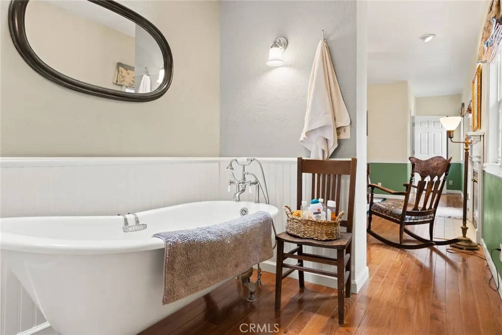 Primary bath with a new claw foot soaking tub.