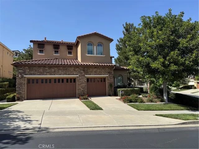 Beautiful Curb Appeal and a 2-car, side-by-side, covered/safe parking garage.