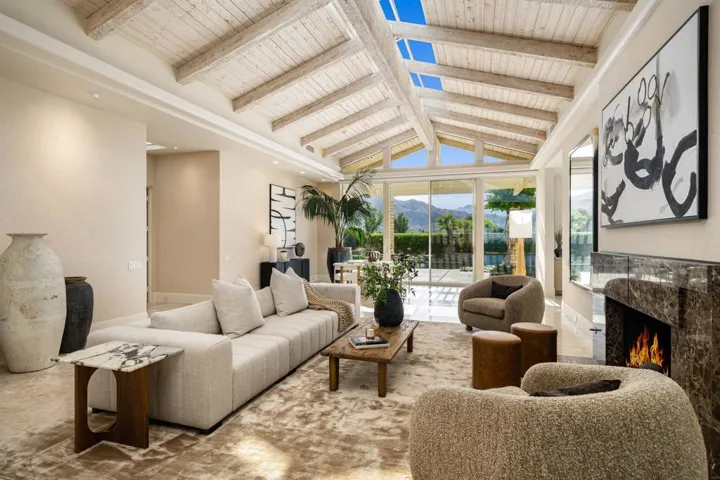Living room with vaulted ceiling