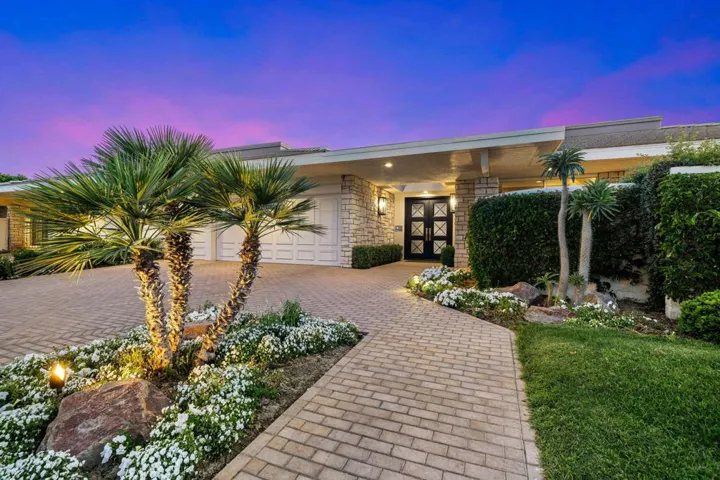 Front with paver driveway