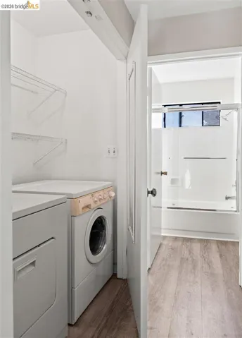 upstairs hallway with laundry room to the left