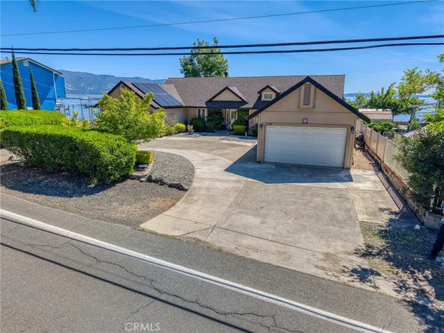 Home with Boat Garage and rounded driveway.