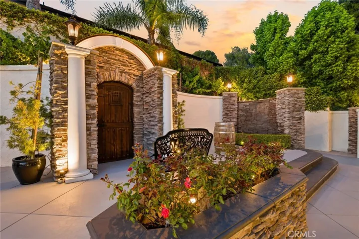 Outdoor cellar or storage closet and rock waterfall