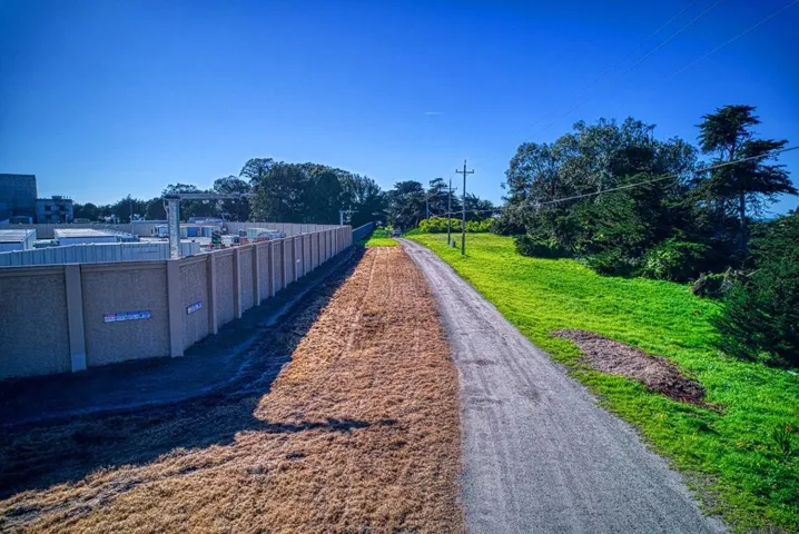driveway leading out to Hwy 1
