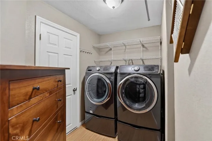 Laundry room and linen closet on bedroom level