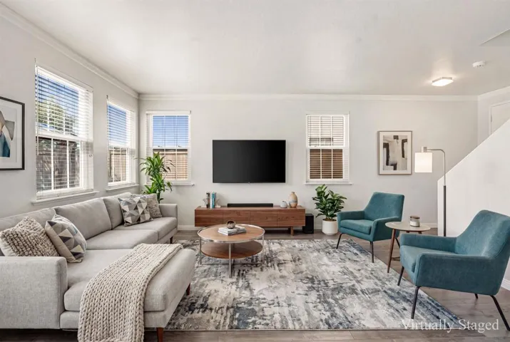 The bright, inviting main living areas feature an open-concept flow ideal for both daily relaxation and easy entertaining.