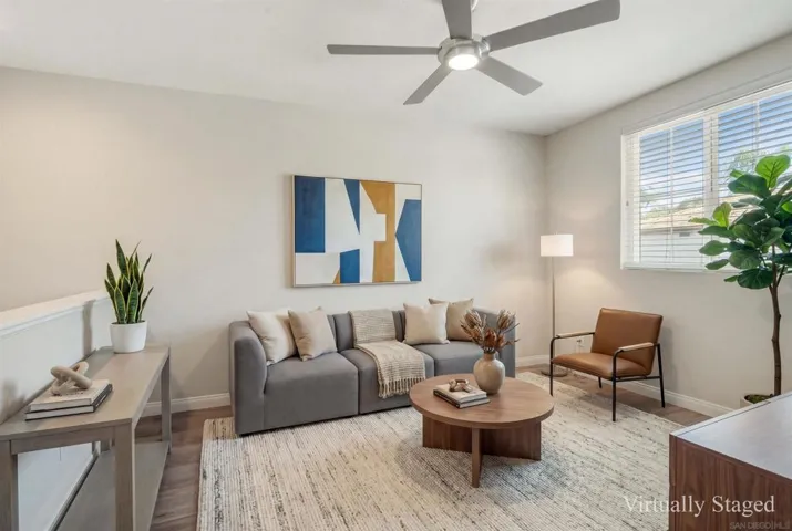 Versatile second-floor loft space, perfectly positioned for a quiet home office, tech station, or media room.