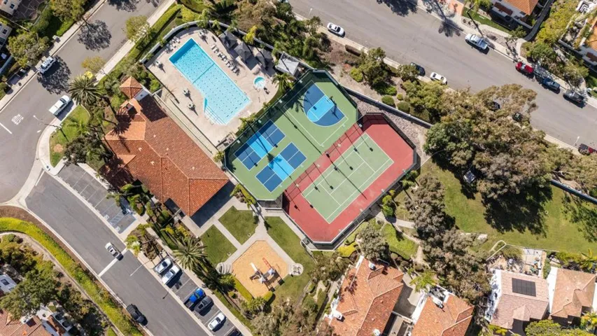Resort-style neighborhood swimming pool offering a pristine environment for relaxation and outdoor exercise.