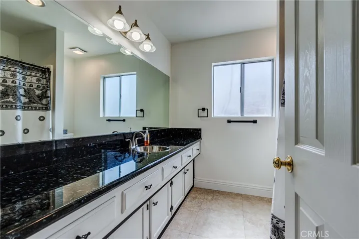 Secondary Bathroom with Granite countertops