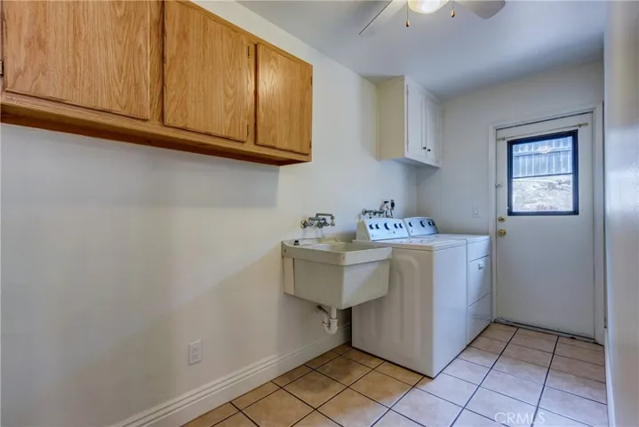 Spacious Laundry Room with Washer & Dryer