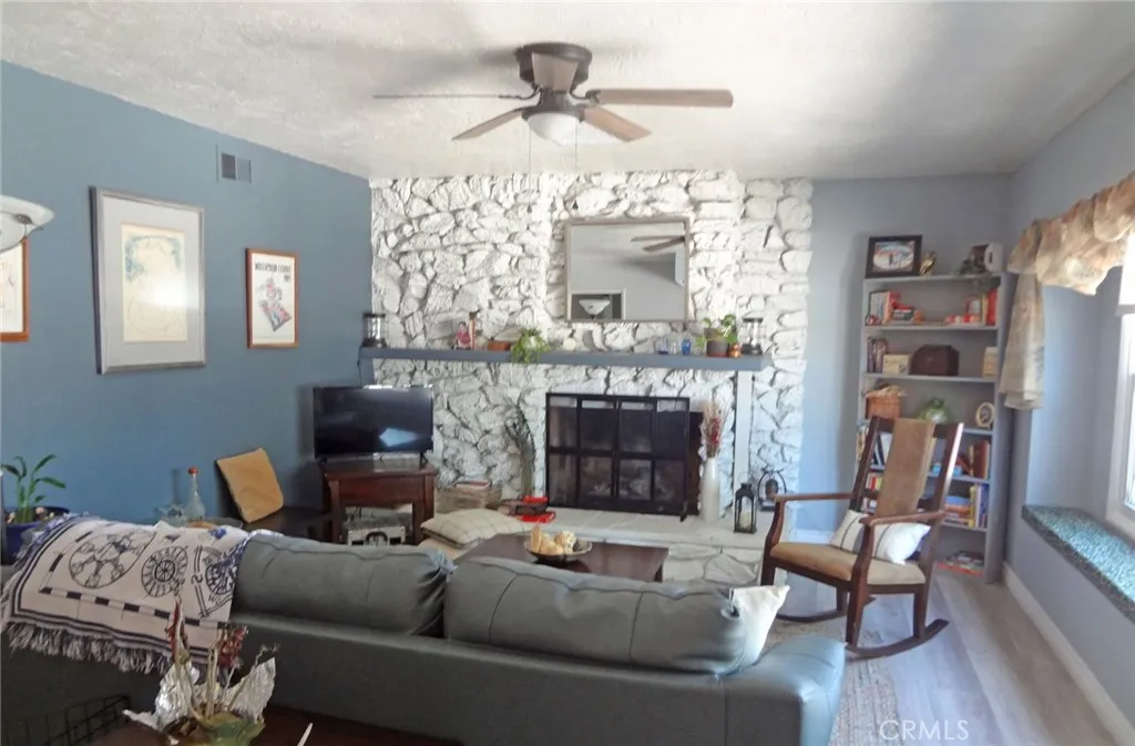 living room with block fireplace