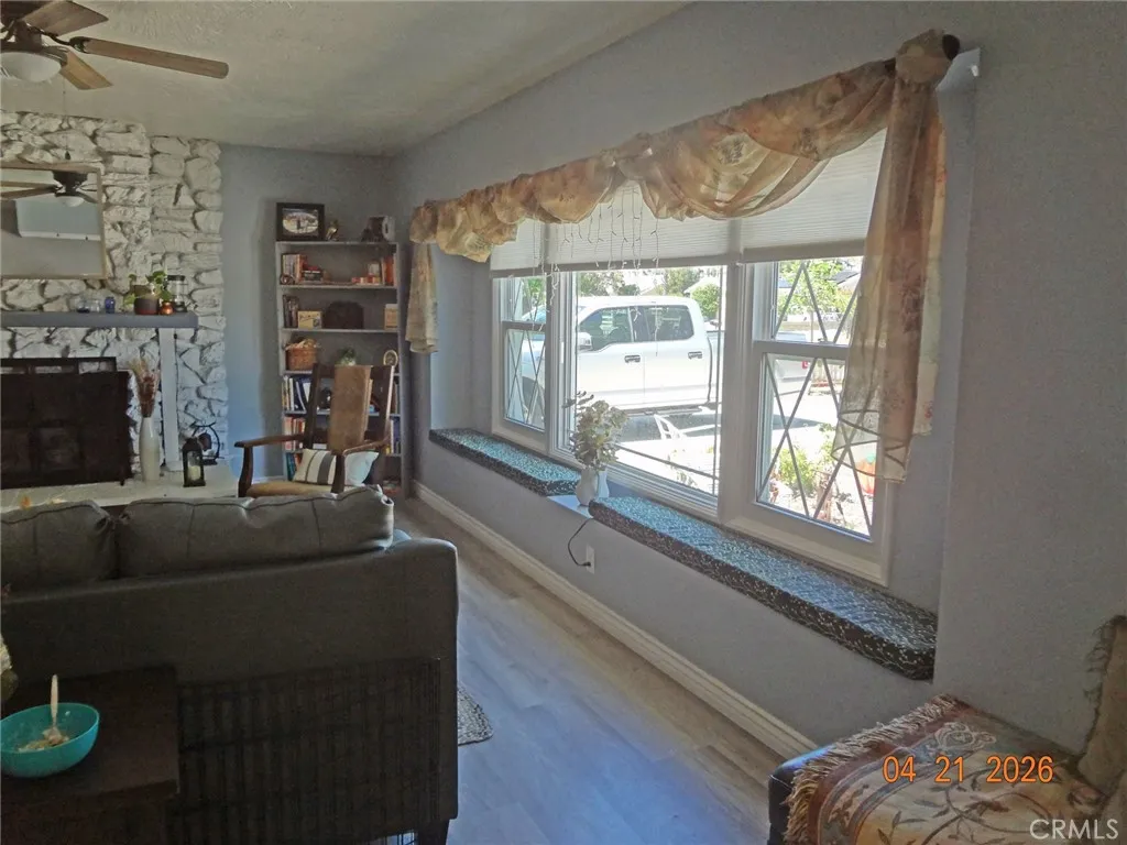 living room new windows and cushion window seat