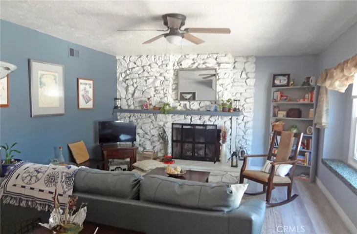living room with block fireplace