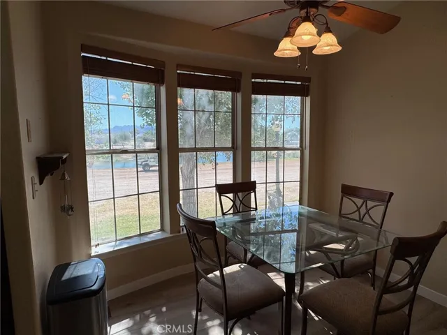 From the laundry come thru a door to the large kitchen area and the amazing breakfast nook. Look at the views here! Lagoon, mountains and even the Sand Dunes just right of that mountain.