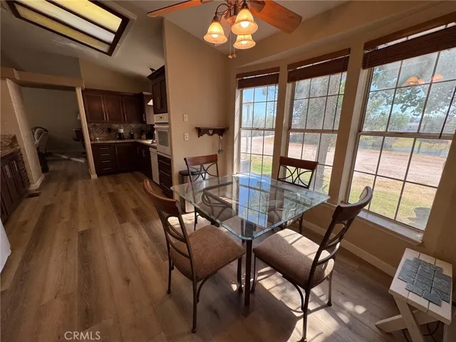 The kitchen then leads to the huge dining area and enormous living room.