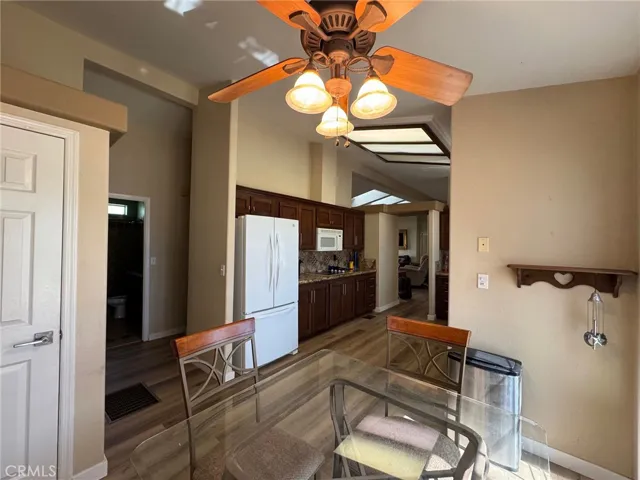 Wide and long kitchen layout, great for 2 cooks! Door on the left is a large walk-in pantry. So convenient!