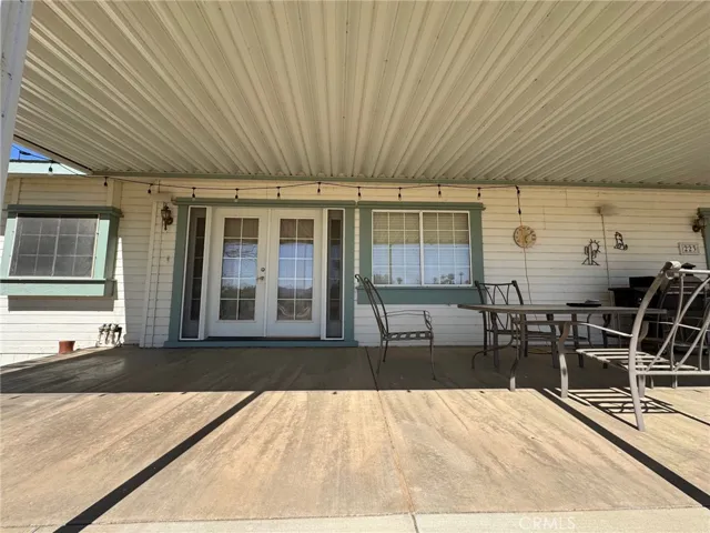 French doors with side lights out the center of the home