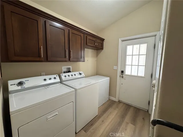 Walk in the laundry room from the garage (very practical) Like a mud room. Nice cabinet too.
