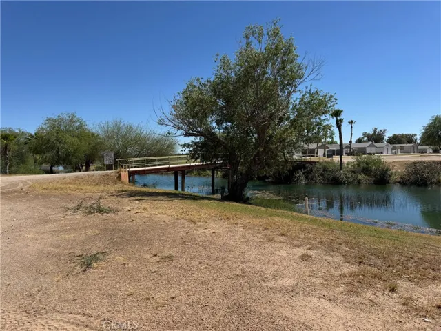 This is a view also from the deck/porch of the cute bridge for golf carts and motorcycles and walking.