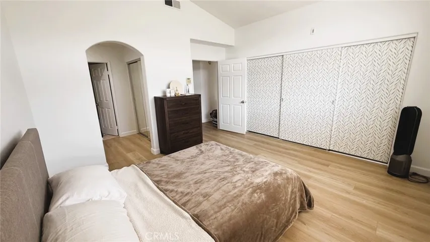 Mirrored closet doors behind peel and stick wallpaper. Wallpaper will be removed for new tenant(s).