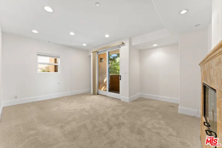 Primary Bedroom w/ Balcony and
