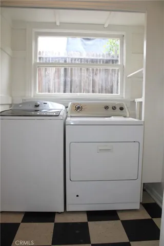 Washer/Dryer included in separate laundry area