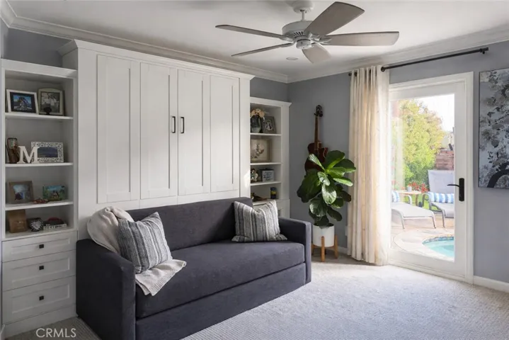Bedroom with door leading to spa