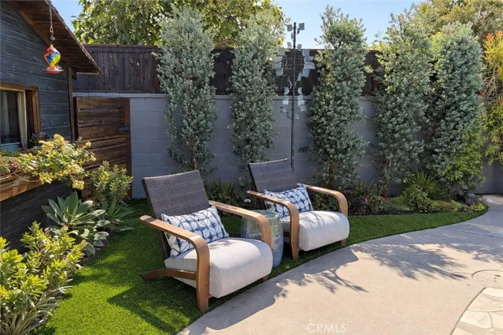 Artificial turf near pool and mature trees